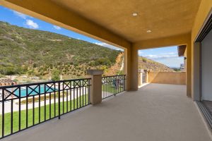 545 Ledge Street San Marcos covered deck overlooking pool, backyard and hillside views