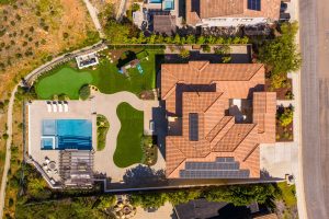 545 Ledge Street San Marcos aerial view of home, pool, spa, putting green and outdoor amenities
